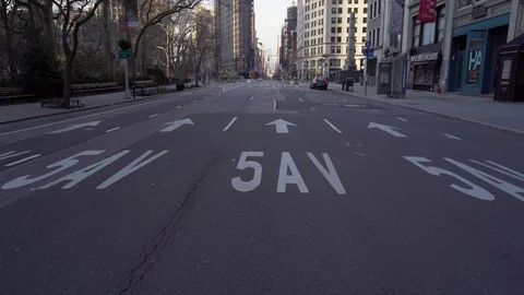 A rare wide angle view of 5th Avenue in New York City panning up towards Stock Footage