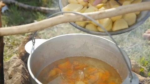 Rash Potatoes. in the Boiling Cauldron. at the Stake. Slowmotion Video stock 98150202