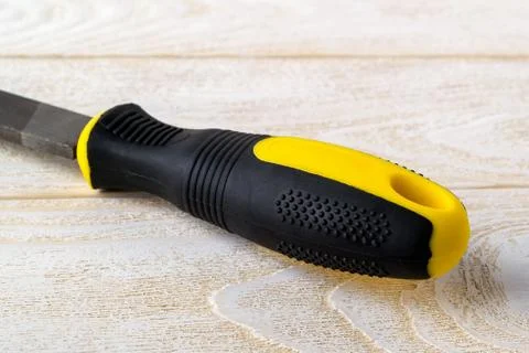 Rasp handle with a coating which eliminates the tool slipping in hands. Stock Photos