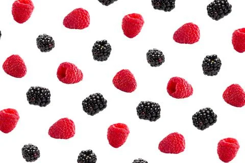 Raspberries abstract background. Fruit pattern of colorful wild berries isolated Stock Photos