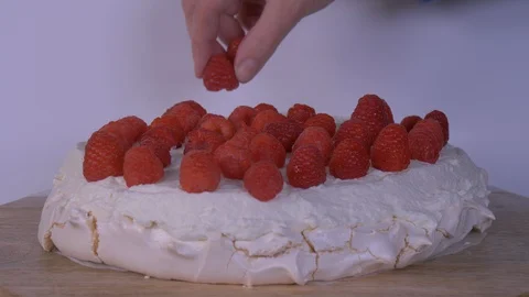 Raspberries being Placed on a Cake. Cake, Raspberries Video stock 128016670