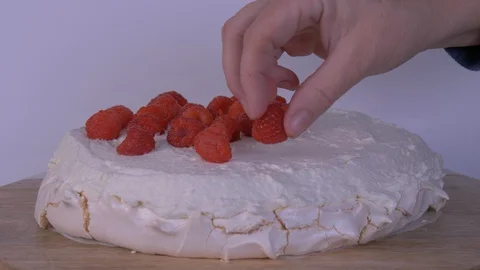 Raspberries being Placed on top of a Cake. Cake, Raspberries Video stock 128014987