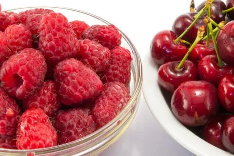 Raspberries with cherries Foto stock