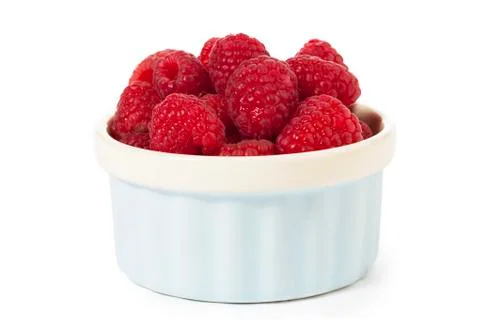 Raspberries in a container Stock Photos