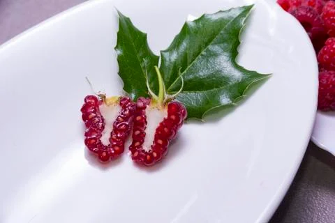 Raspberries cut in half Stock Photos