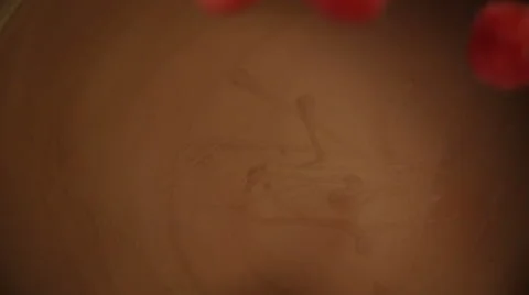 Raspberries Falling into Melted Chocolate Video stock 51599978