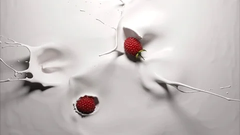 Raspberries falling into yogurt Stock Footage 105034769