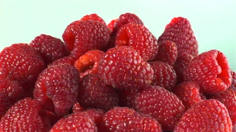 Raspberries isolated rotating on white background Stock Footage 62393259