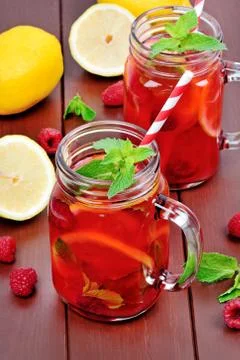 Raspberries lemonade in a jars Stock Photos
