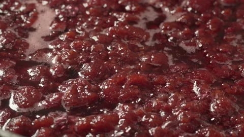 Raspberries in pan for jam. Process of cooking, boiling berries for canning Stock Footage 135549673