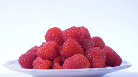 Raspberries Rotating over white Background. Raspberries, berries Stock Footage 127903412