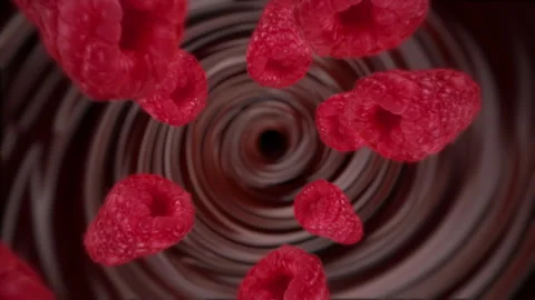 Raspberries spiraling and falling in the liquid chocolate spinning slow motion Stock Footage 258483780