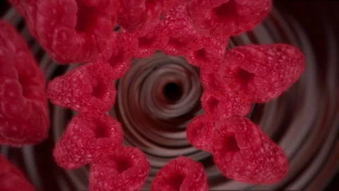 Raspberries spiraling and falling in the liquid chocolate whirlpool slow motion Stock Footage 258486520