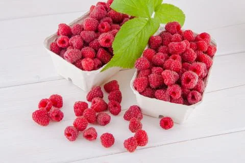 Raspberries on a table Stock Photos