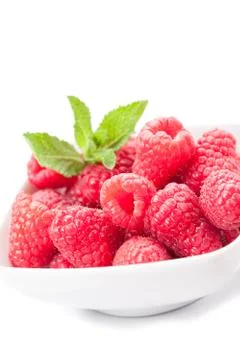 Raspberries on white background Stock Photos