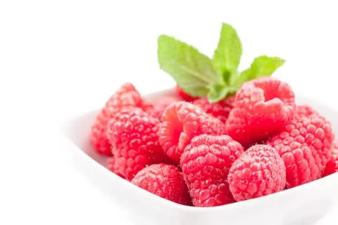 Raspberries on white background Stock Photos