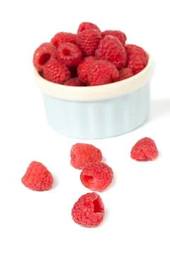 Raspberries in white background Stock Photos