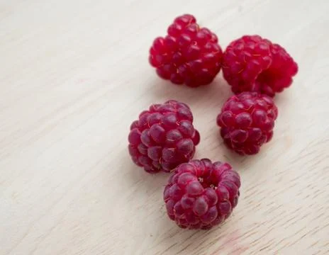Raspberries on white background Stock Photos