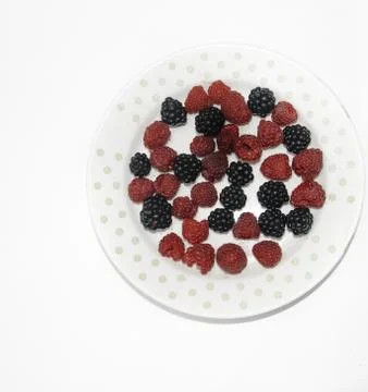 RASPBERRY AND BLACKBERRY on a white background with space for the text Stock Photos