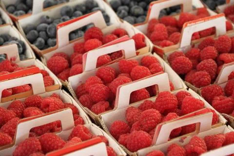 Raspberry and blueberries in basket Raspberry and blueberries in basket as... Stock Photos