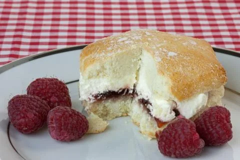 Raspberry and cream scone Stock Photos