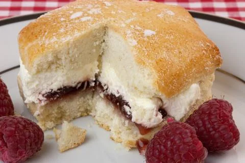 Raspberry and cream scone Stock Photos