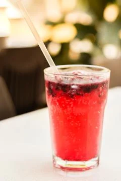 Raspberry and Sprite lemonade with ice cubes in a glass Stock Photos