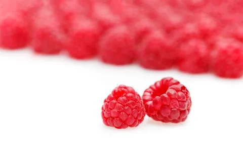 Raspberry berries isolated on white Stock Photos