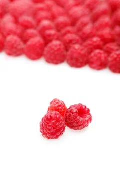 Raspberry berries isolated on white Stock Photos