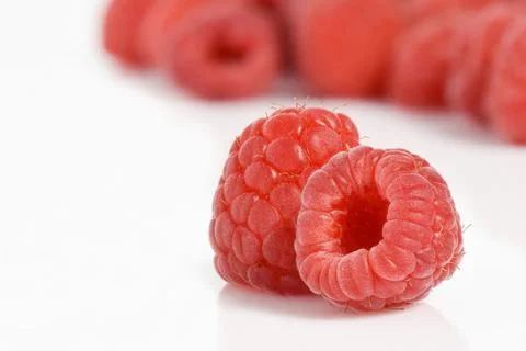 Raspberry berries on a white background. Stock Photos