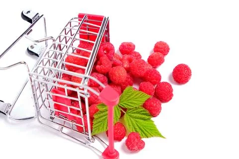 Raspberry berry and a green leaf in a shopping cart on a white background. Stock Photos