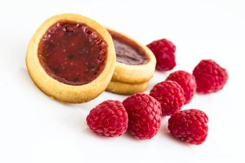 Raspberry biscuits with a few beries Фото