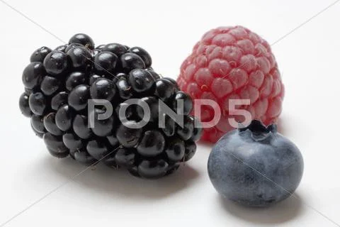Raspberry, blackberry and blueberry (close-up) Stock Photos