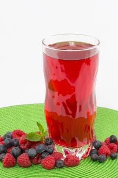Raspberry blueberry juice Stock Photos