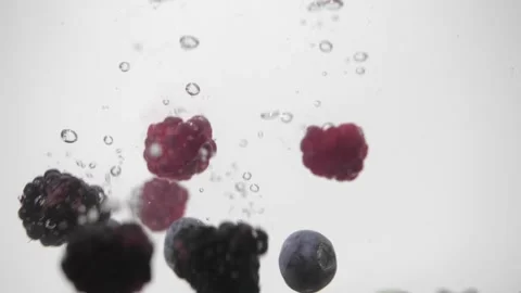 Raspberry, blueberry, raspberries falling in to the water 50fps 動画素材 156607129