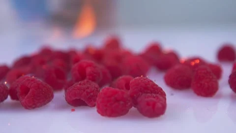 Raspberry is burning with fire in slow motion. Stock Footage 141523025