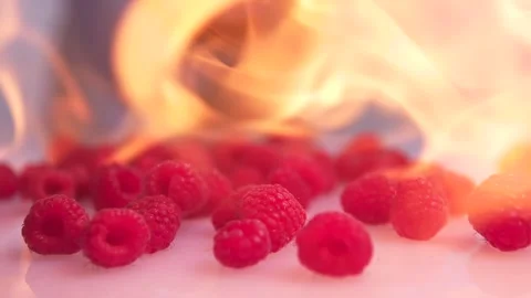 Raspberry is burning with fire in slow motion Stock Footage 142891757