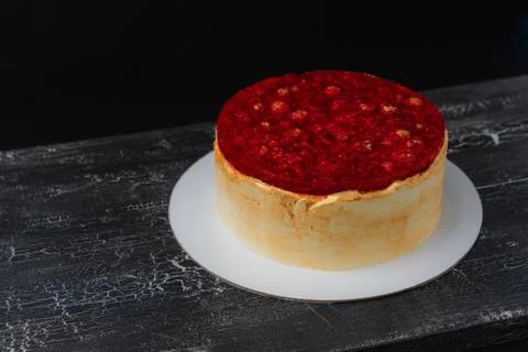 Raspberry cake on black board Stock Photos