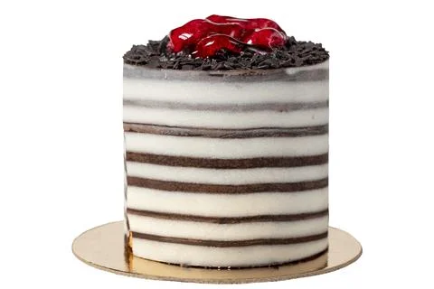 Raspberry cake. Delicious chocolate covered cake on a white background. Close Stock Photos