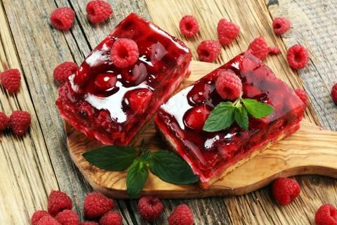 Raspberry Cake for holidays with mint and fresh delicious raspberries Stock Photos