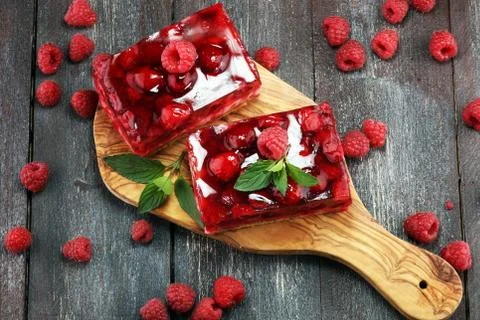Raspberry Cake for holidays with mint and fresh delicious raspberries Stock Photos