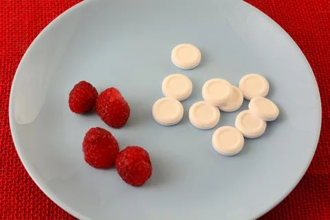 Raspberry candy pieces Foto stock