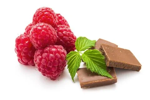 Raspberry , chocolate and green leaf on white Stock Photos