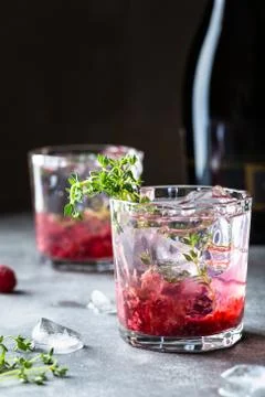 Raspberry cocktail with thyme. Stock Photos
