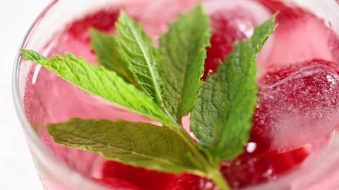 Raspberry cocktail.Summer drink. glass with raspberry pink drink Stock Footage 189128120