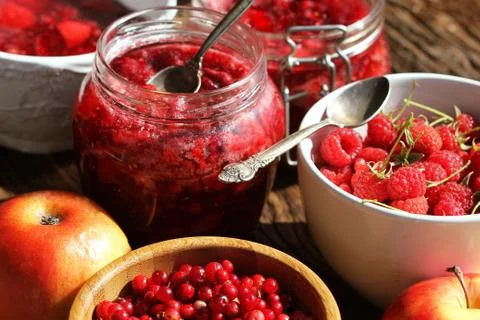 Raspberry, cranberry, apple jam Stock Photos