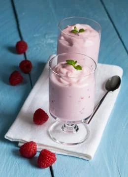 Raspberry cream dessert with mint Stock Photos