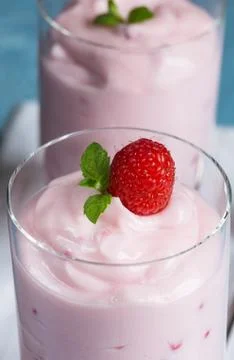 Raspberry cream dessert with mint Stock Photos