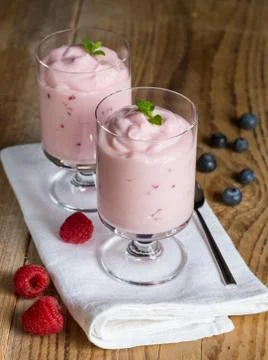 Raspberry cream dessert with mint 스톡 사진