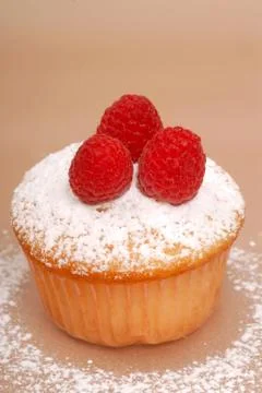 Raspberry cupcake Stock Photos